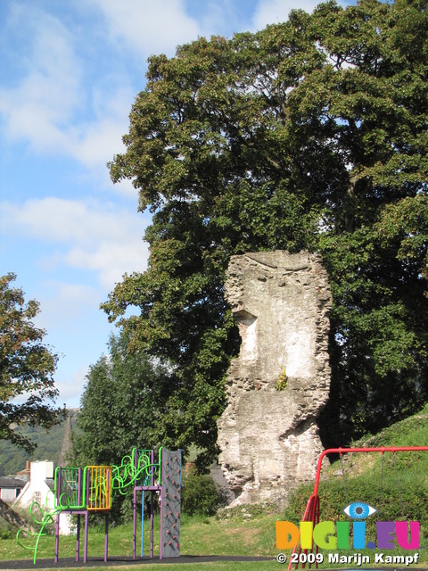 SX09658 Single wall of Crickhowell Castle tower by playground equipement